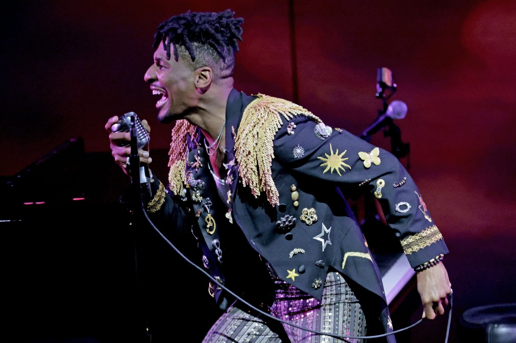 Jon Batiste performs at the Muny